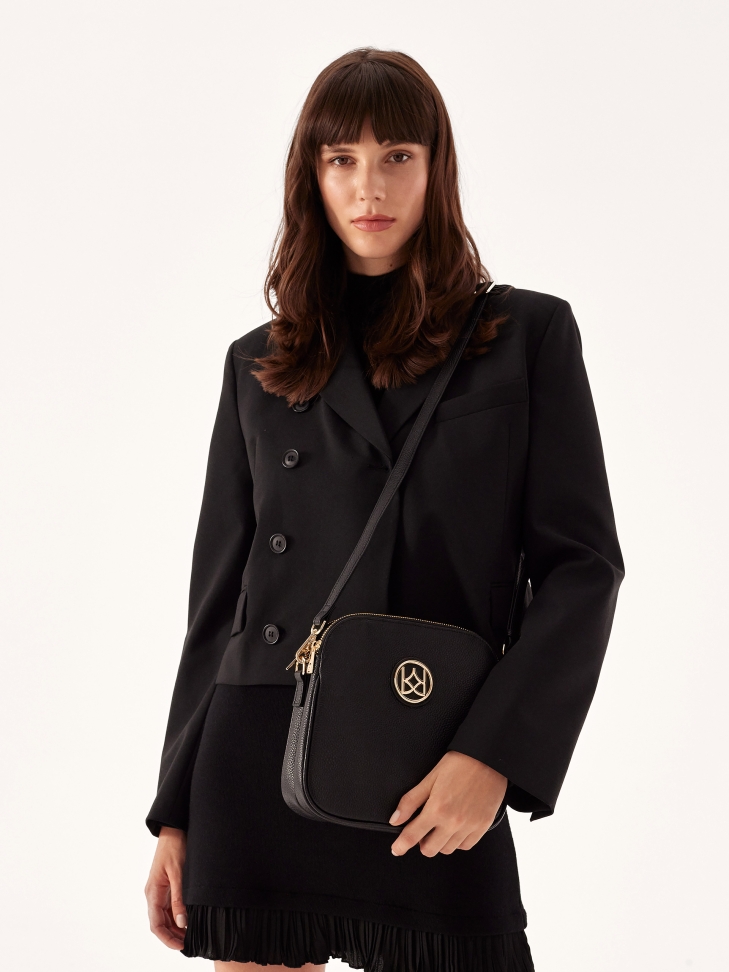 Skórzana torebka listonoszka z monogramem POLINE