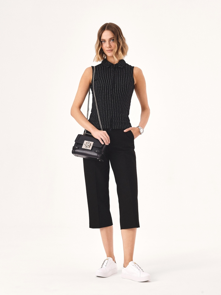 Białe sneakersy w tłoczone monogramy KAZAR MALIA