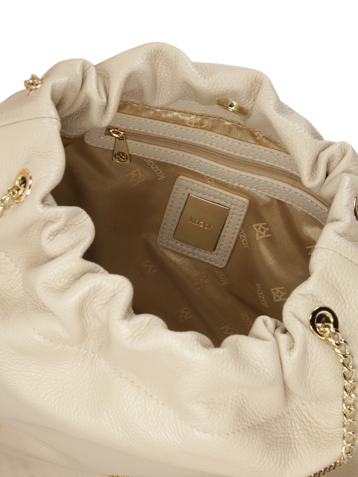 Kremowa torebka worek z łańcuchami  HAIDIE